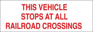 THIS VEHICLE STOPS AT ALL RAILROAD CROSSINGS